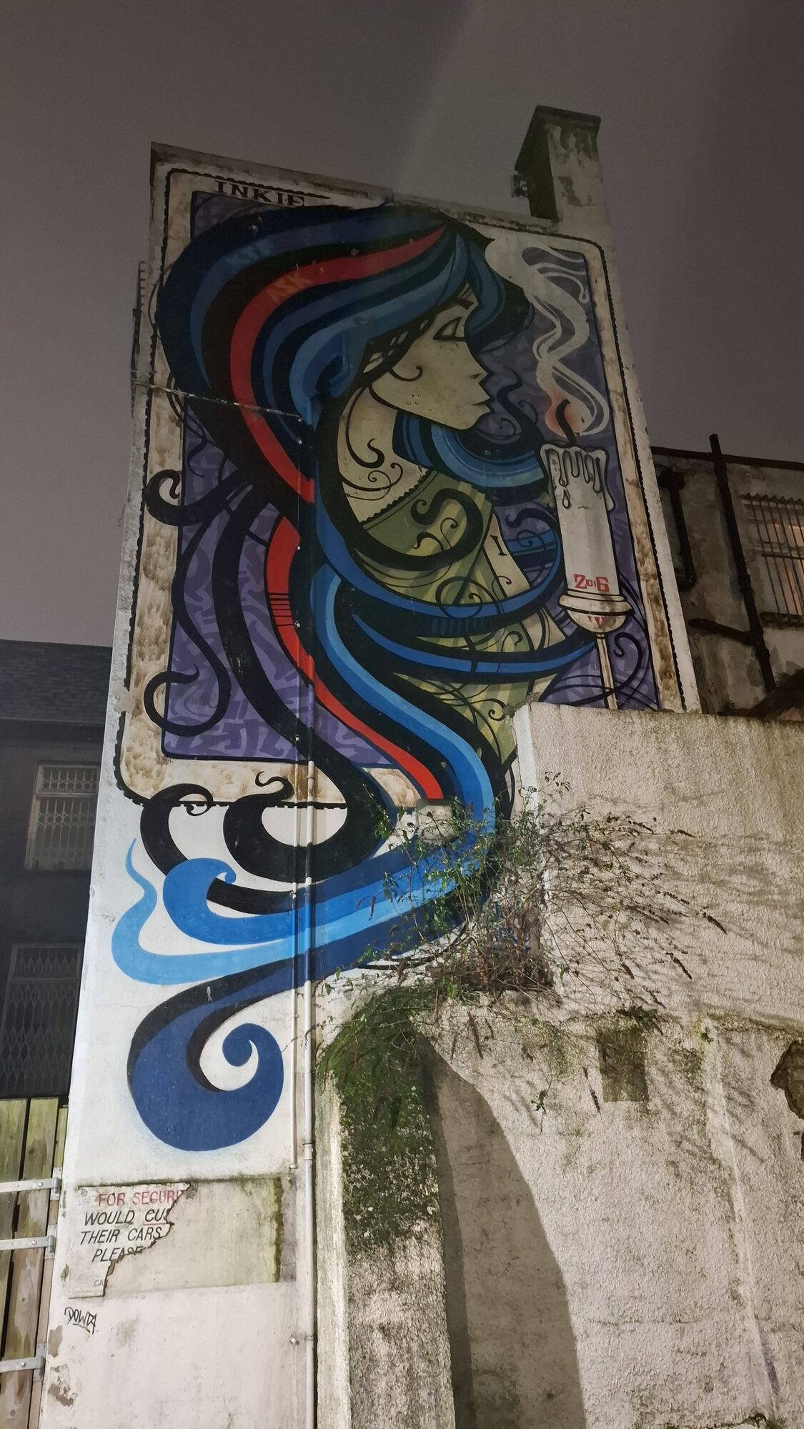 Mural near the Cathedral Quarter at night