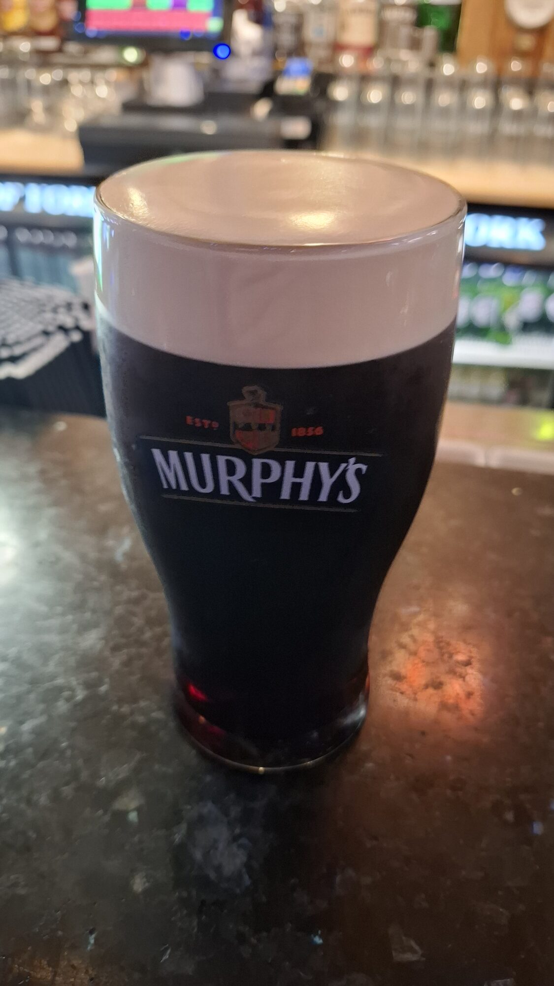 A pint of Murphy&rsquo;s at the bar