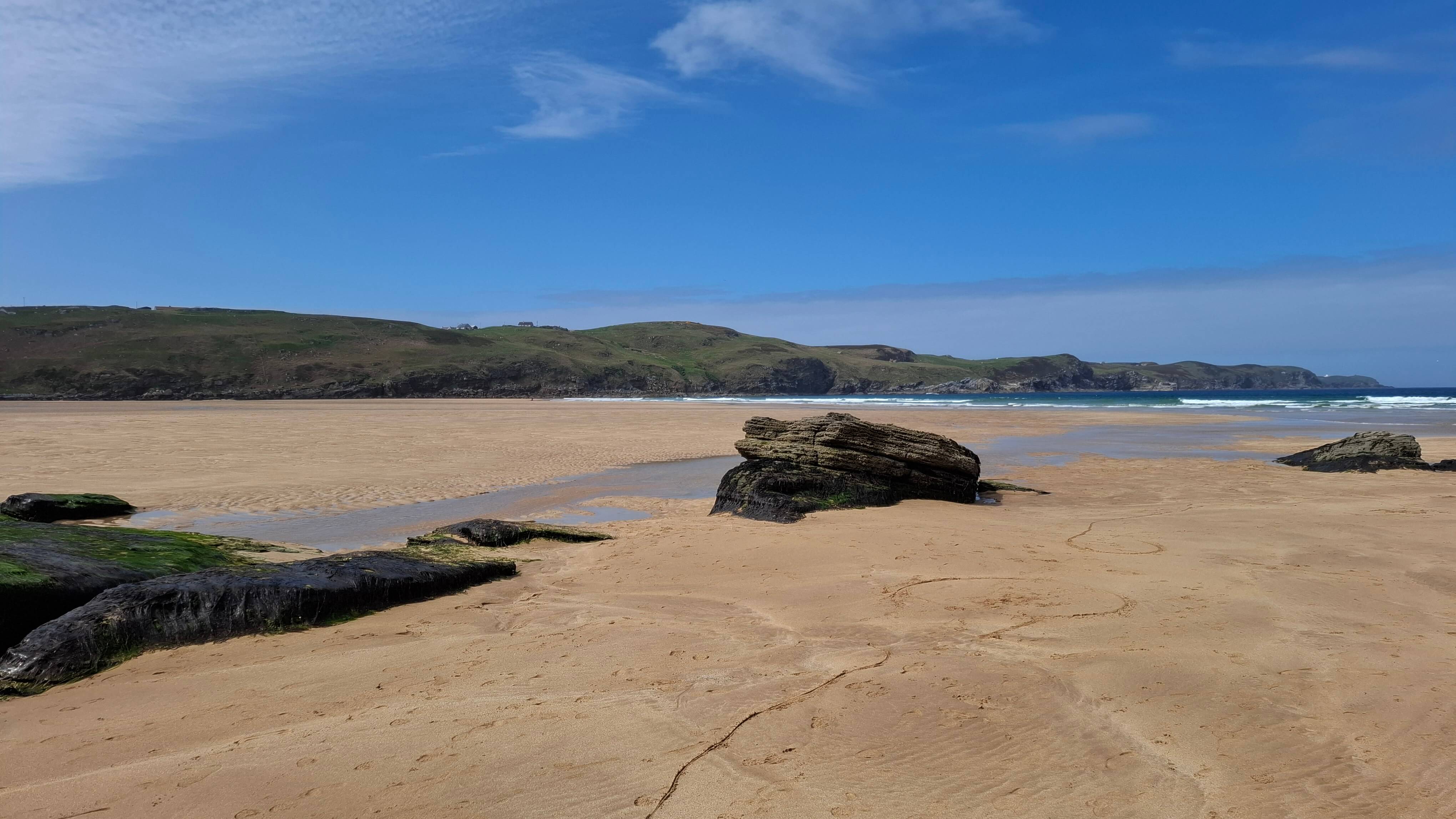 Blue skies over Strathy Beach