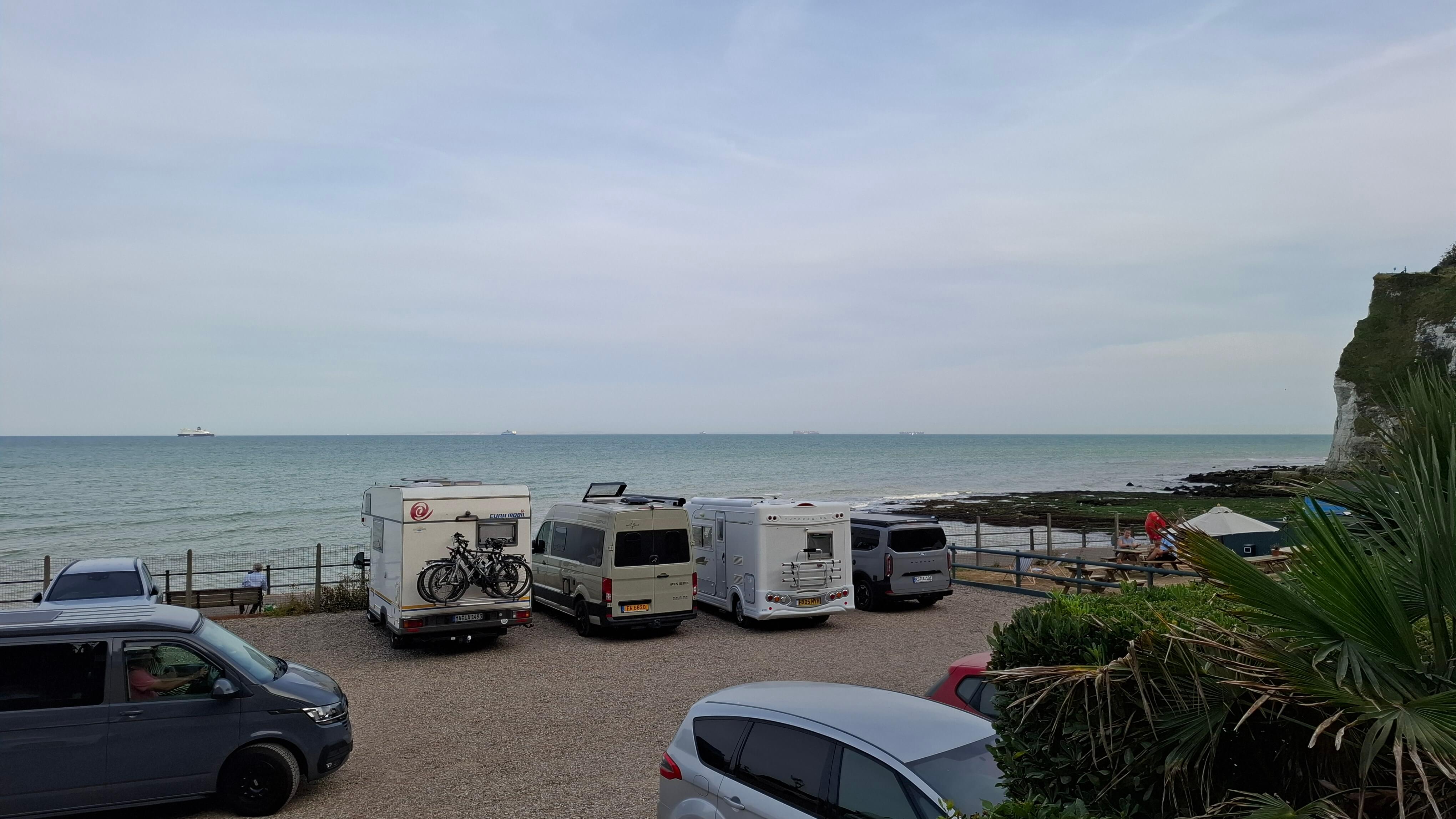 The car park above the pub, overlooking the sea