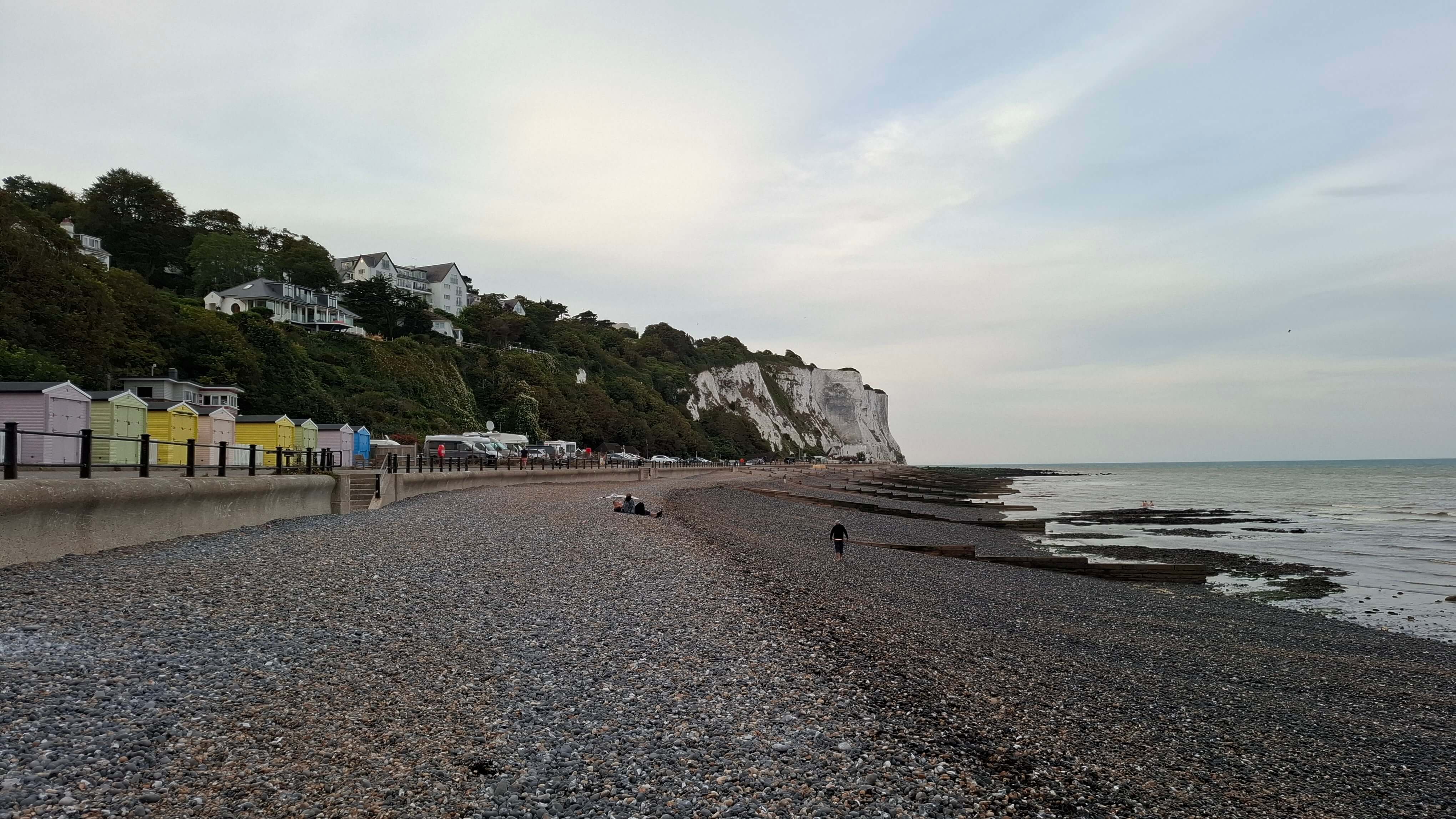 The beach stretching towards the white cliffs