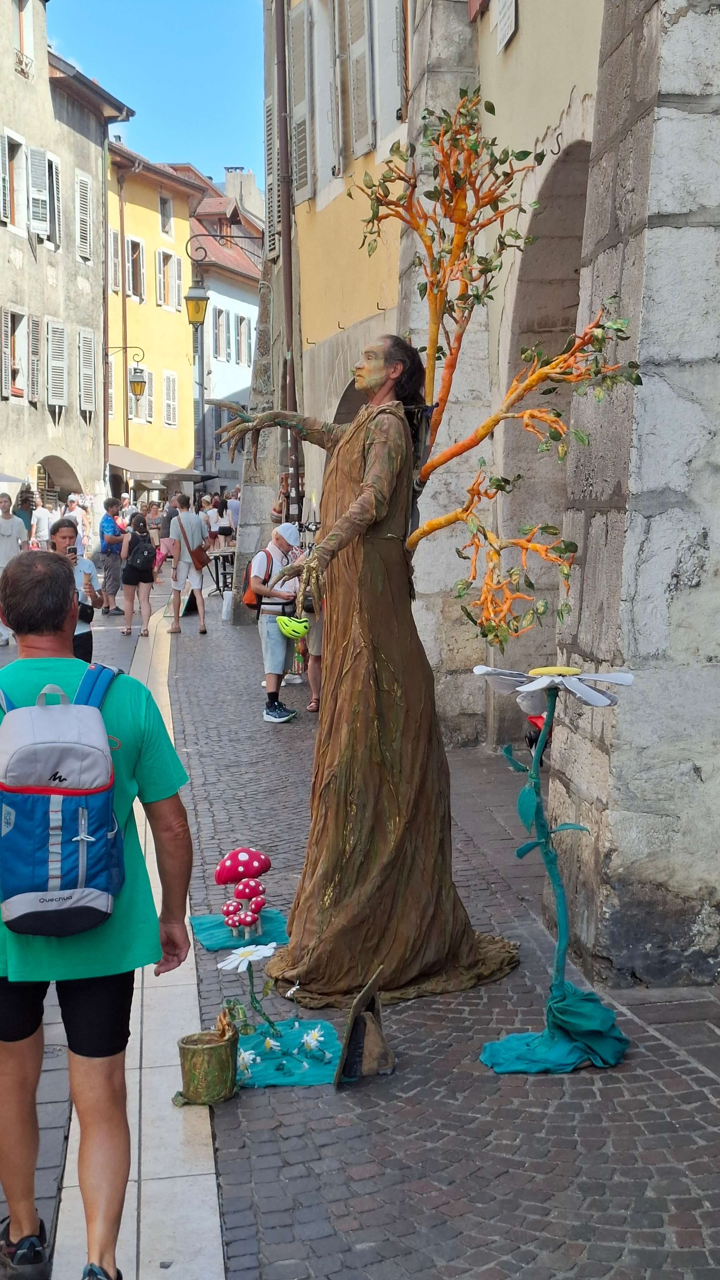 A street performer dressed as a tree