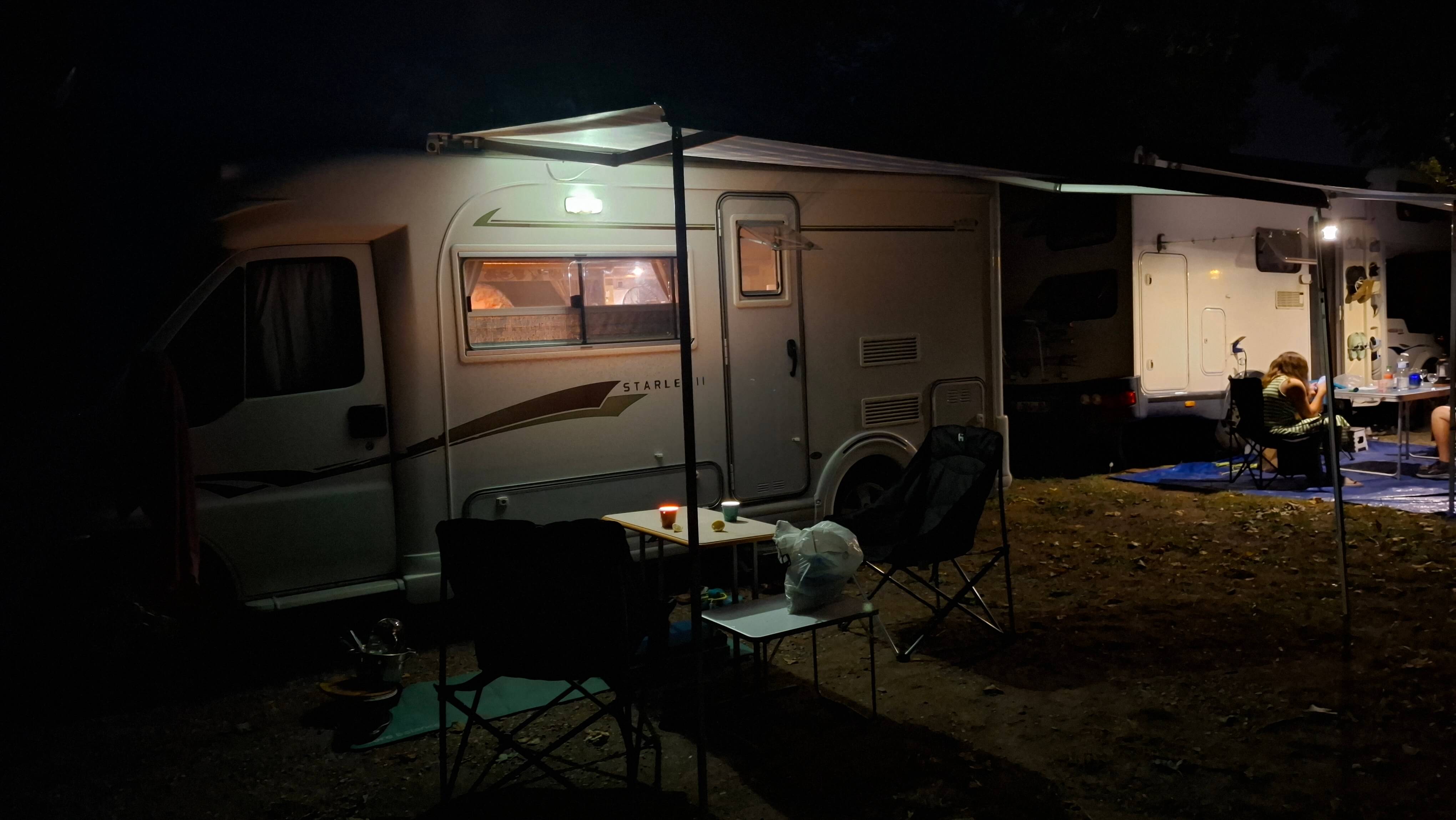 The van lit up for the night
