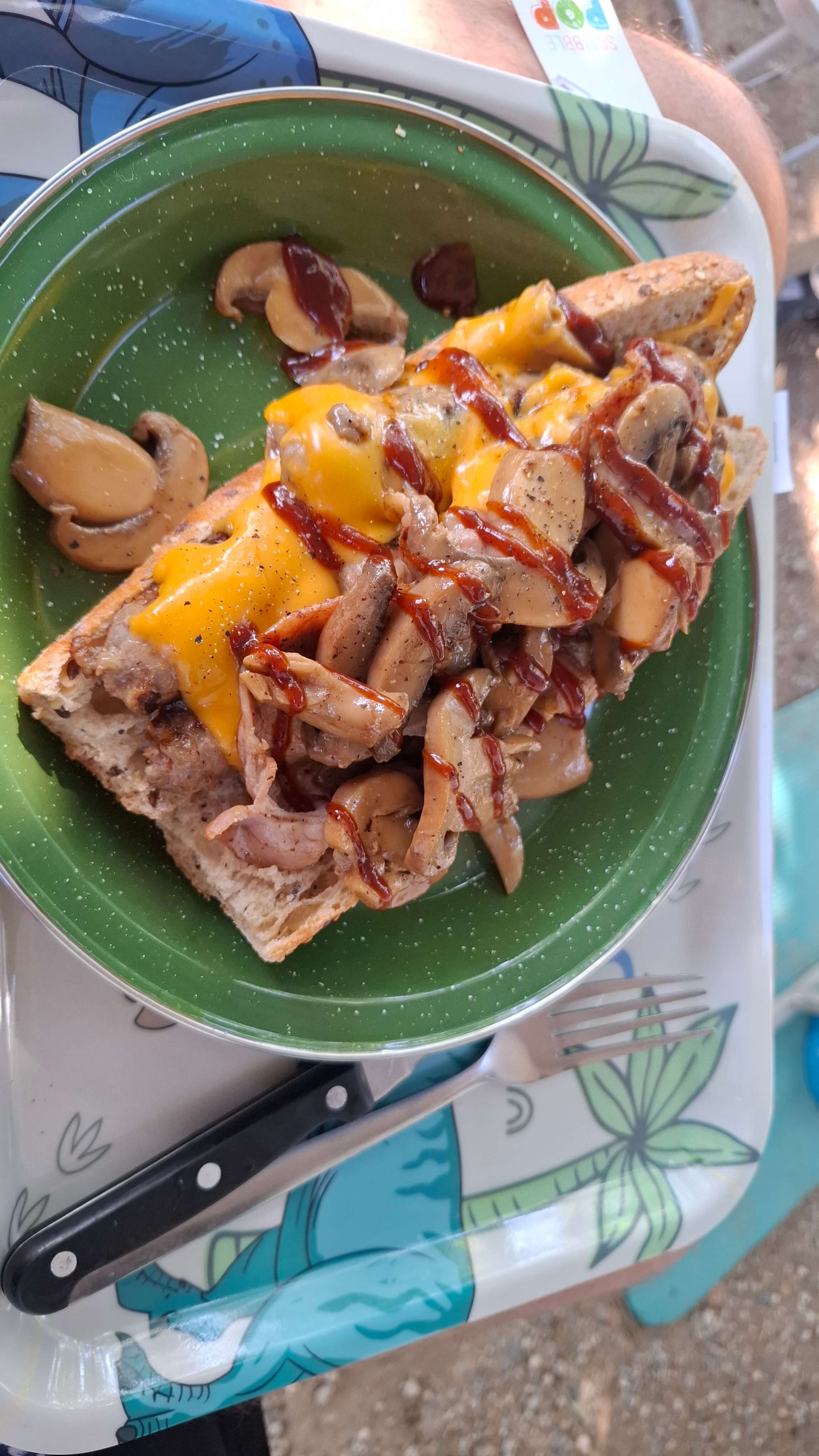 Sausage, bacon and champignon baguette