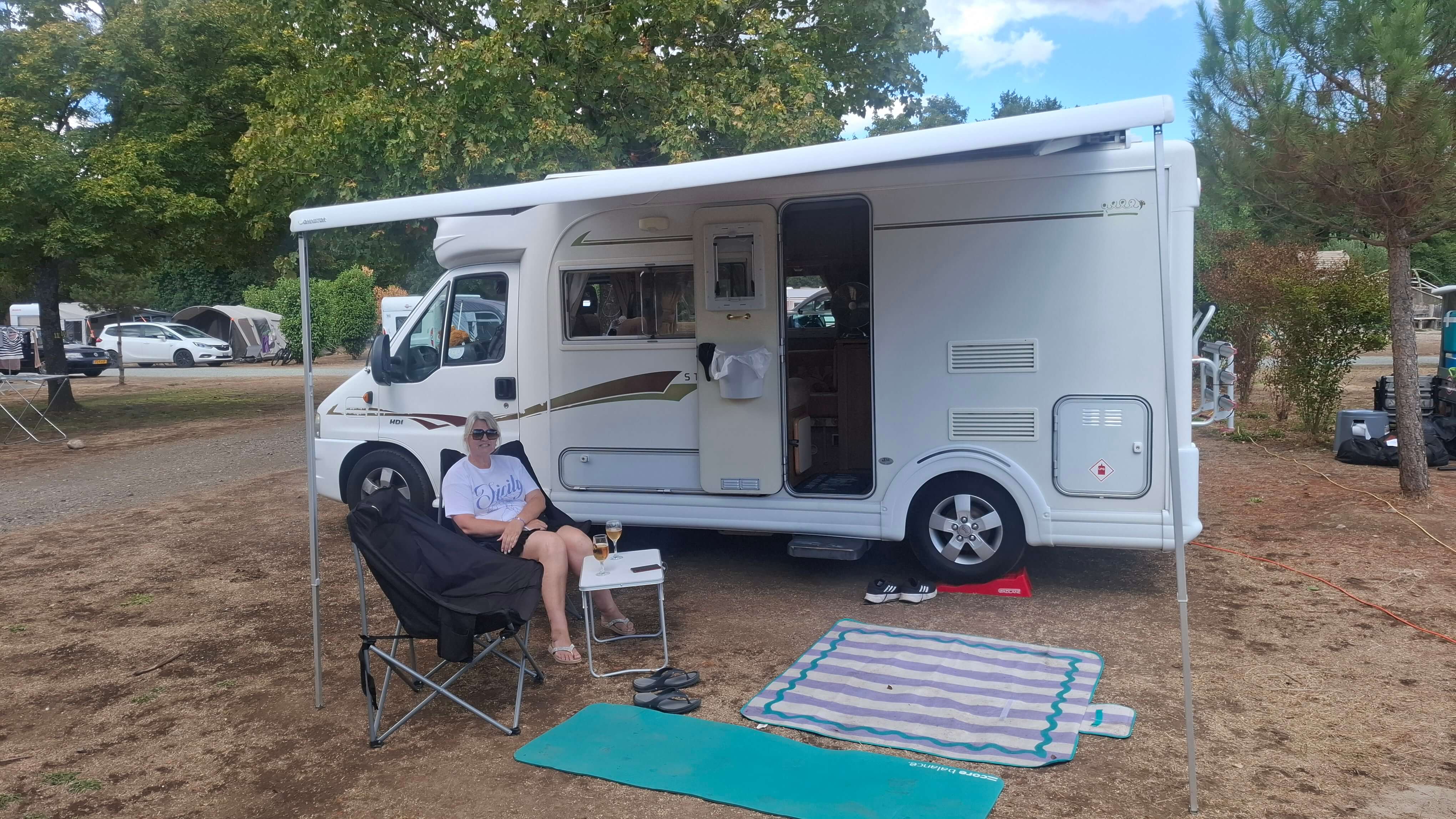 Setting up van at lakeside pitch