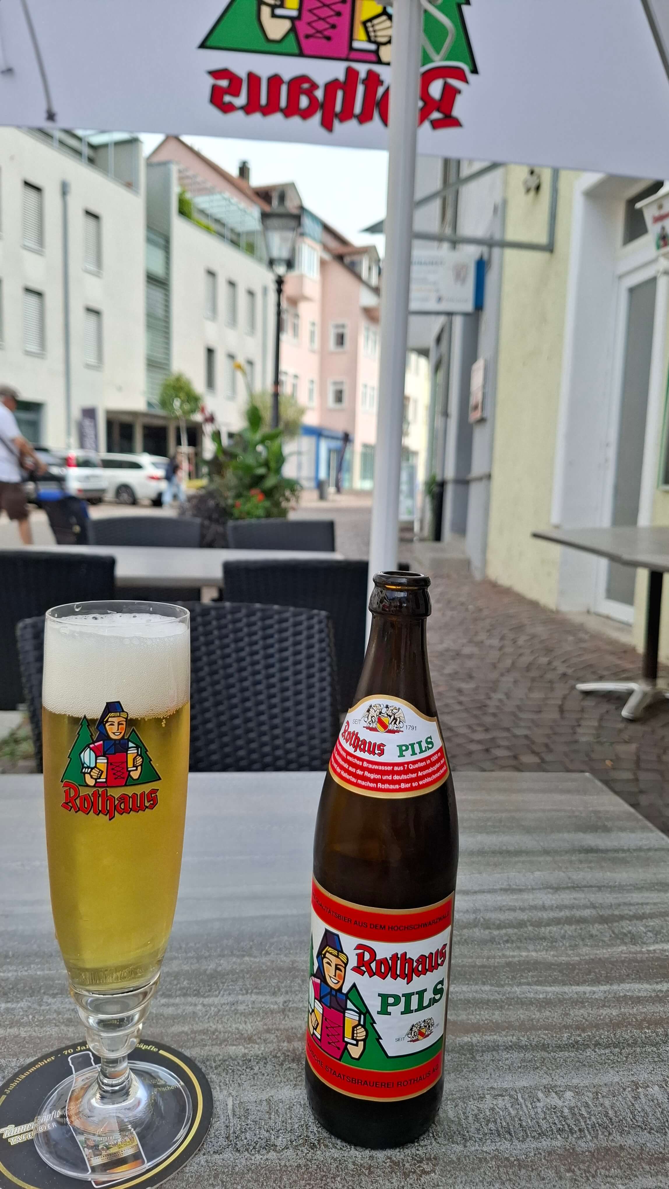 Enjoying a local Rothaus Pils